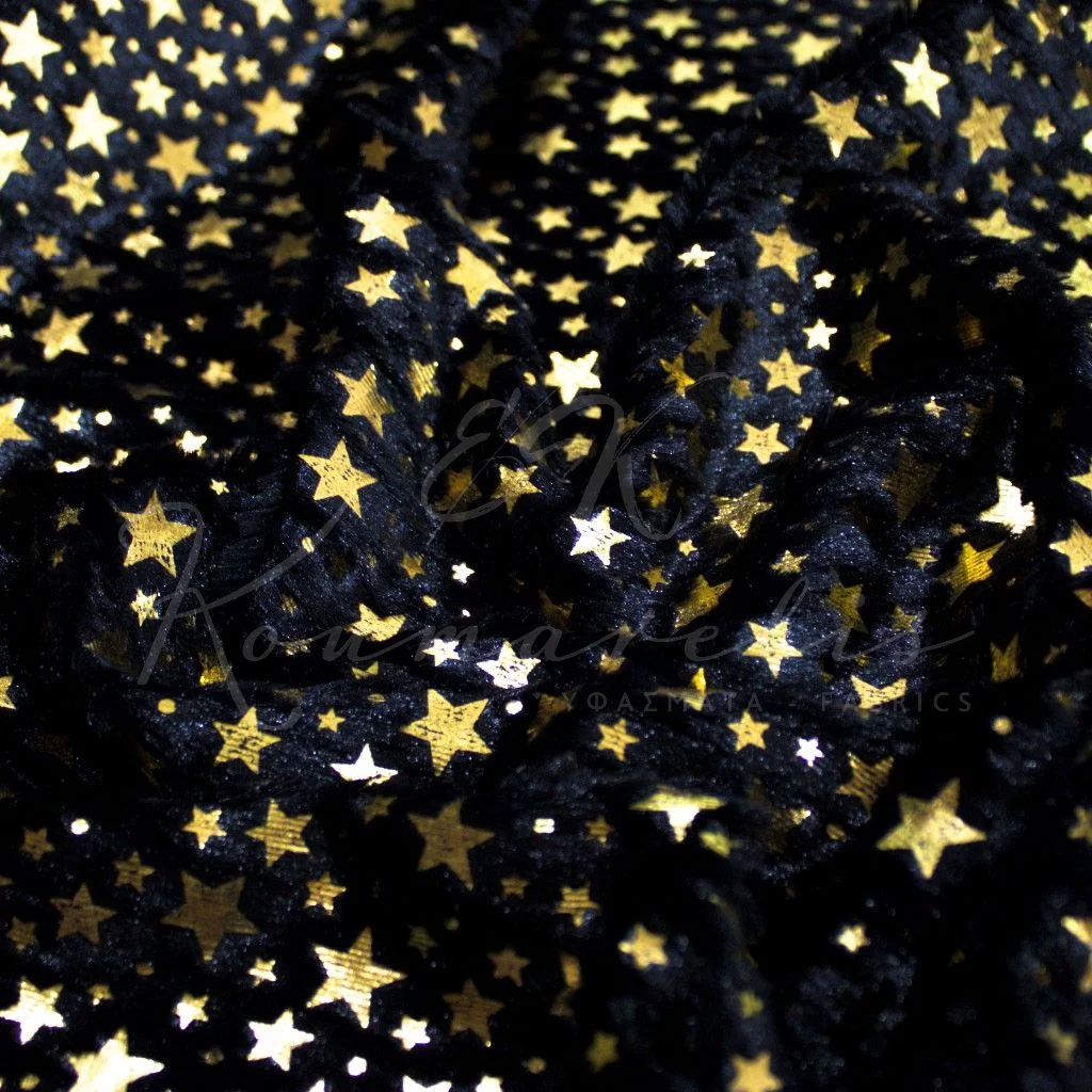 Black fur with gold stars